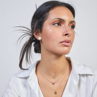 Collana argento rosato con centrale albero della vita traforato tondo