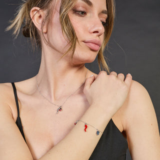 Collana argento rodiato con centrale corno e coccinella smaltata pendenti