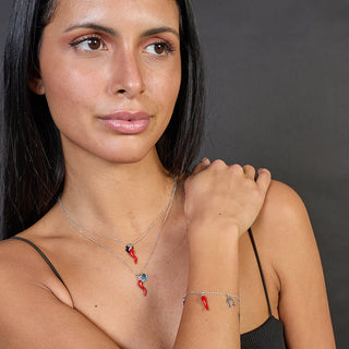 Collana argento rodiato con centrale corno smaltato e cuore pendenti