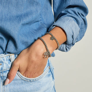 Bracciale acciaio sfere lucide e centrale pendente albero della vita traforato