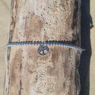 Bracciale acciaio sfere lucide e centrale pendente albero della vita traforato