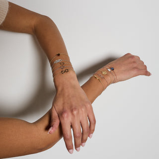 Bracciale argento dorato con centrale cuore storto