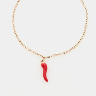 Bracciale acciaio rosato maglia rolò fina con corno acciaio smaltato rosso centrale pendente