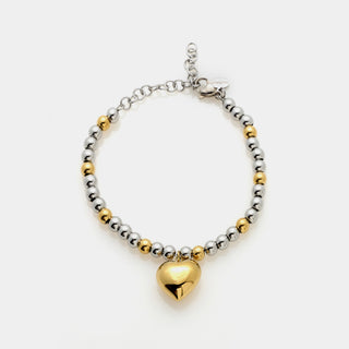 Bracciale acciaio sfere lucide e ogni 3 sfere in acciaio 1 sfera dorata e ciondolo dorato a cuore bombato centrale