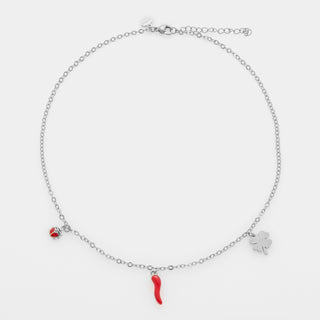 Collana acciaio maglia rolò fina con tre ciondoli in acciaio quadrifoglio, corno smaltato rosso e coccinella smaltata rossa e nera
