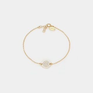 Bracciale argento dorato con centrale disco con quadrifoglio