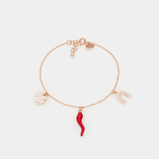 Bracciale argento rosato con corno smaltato, quadrifoglio e ferro di cavallo pendenti